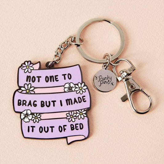 Not One To Brag Enamel Keyring